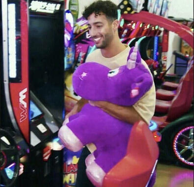 daniel ricciardo with a plushie animal